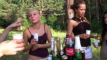 Topless college chicks erotically wash car at the picnic